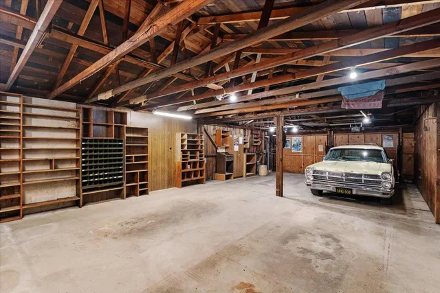 a view of parking garage with chairs