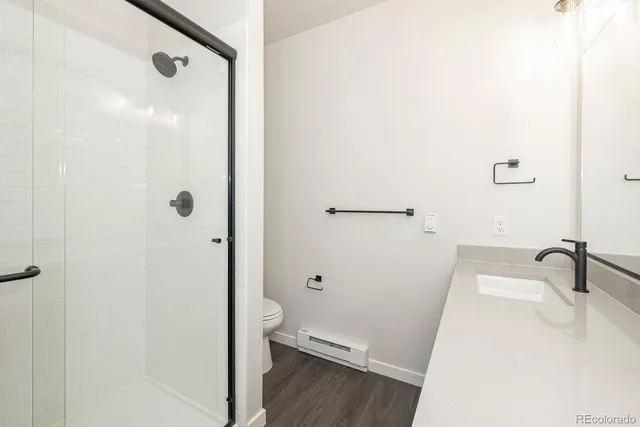 a large white bed in a white room