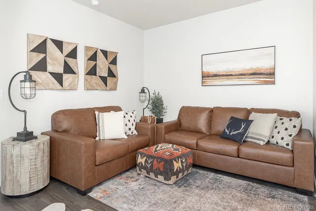 a living room with furniture and a couch