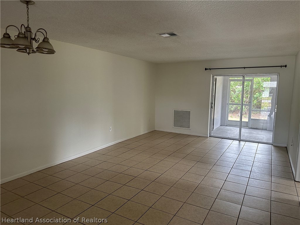 237 Rhapsody Avenue Lake Placid, FL 33852 - Photo 6 of 18 a view of an empty room and a window