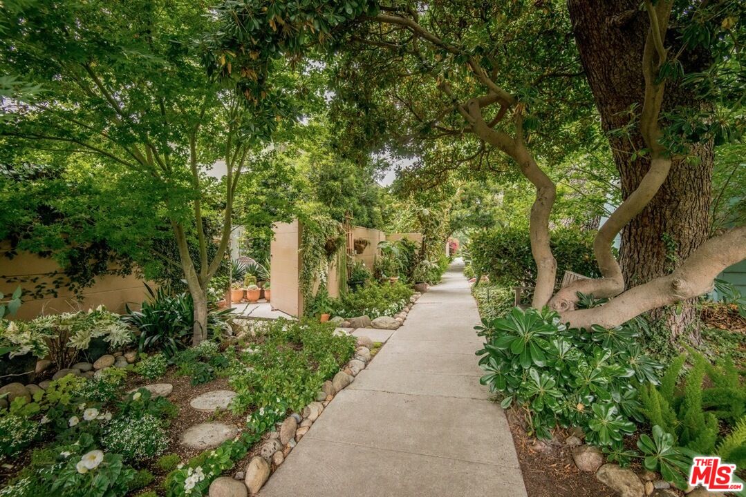 5233 Village Green Los Angeles, CA 90016 - Photo 28 of 34 a view of a pathway with a yard