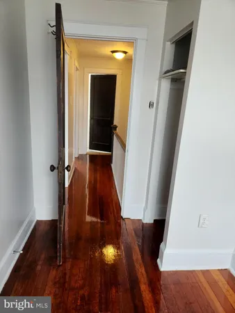 wooden floor with closet