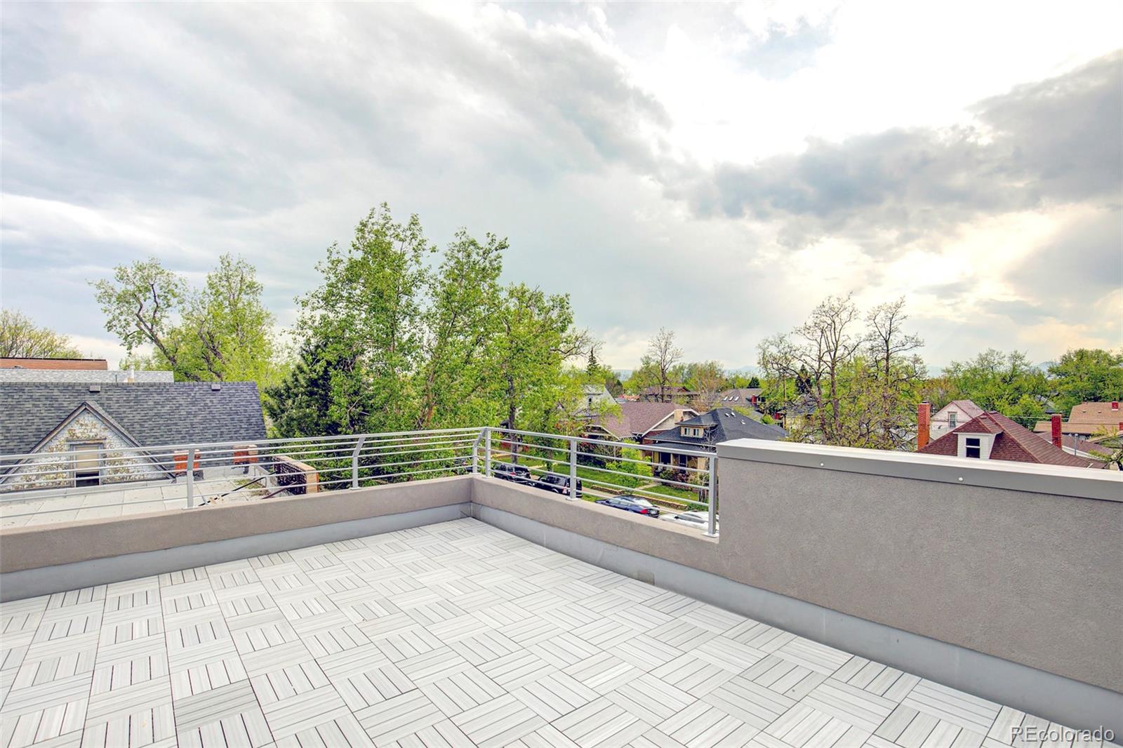 1322 South Pearl Street Denver, CO 80210 - Photo 2 of 39 a view of a terrace with sitting area