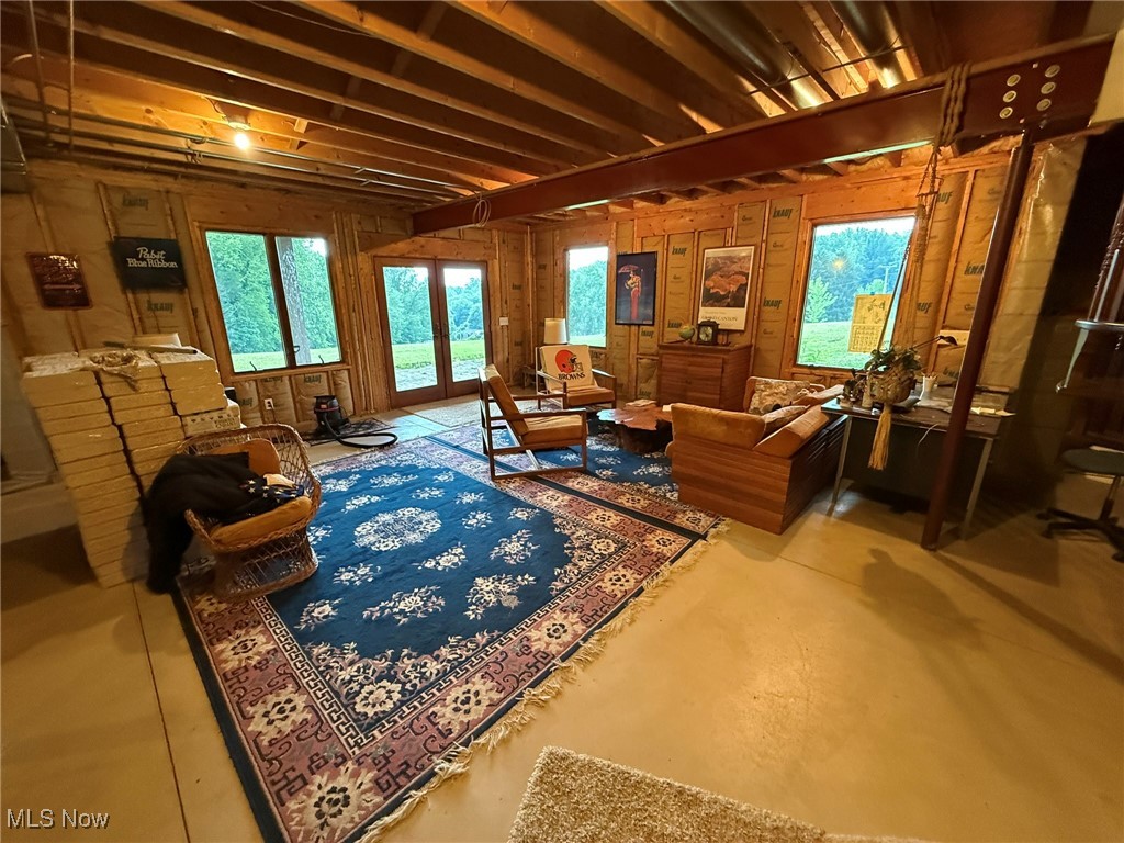 2597 Pyle Road Dover, OH 44622 - Photo 39 of 50 Living room with concrete floors and french doors