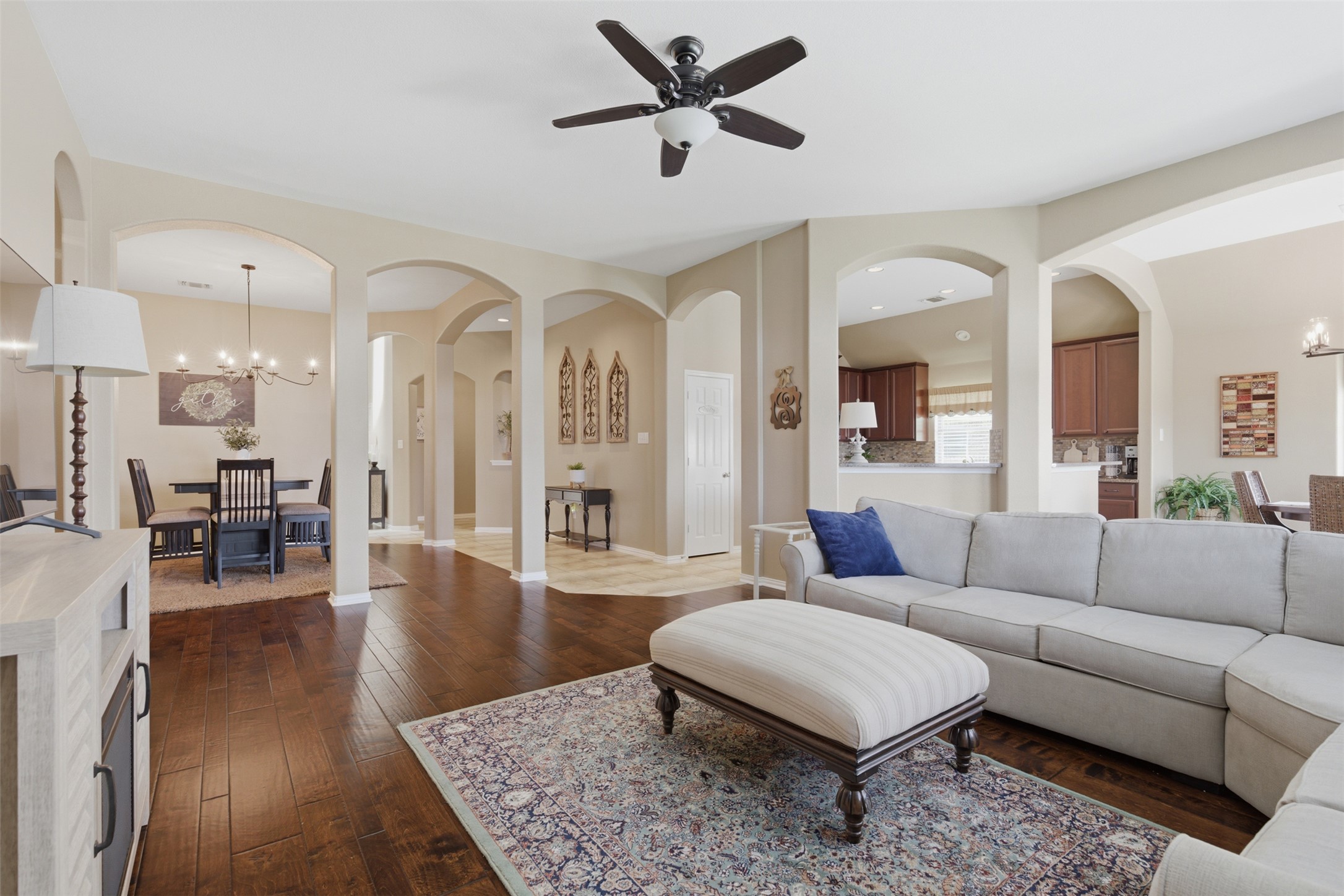 2568 Santa Barbara Loop Round Rock, TX 78665 - Photo 8 of 34 a living room with furniture rug and wooden floor
