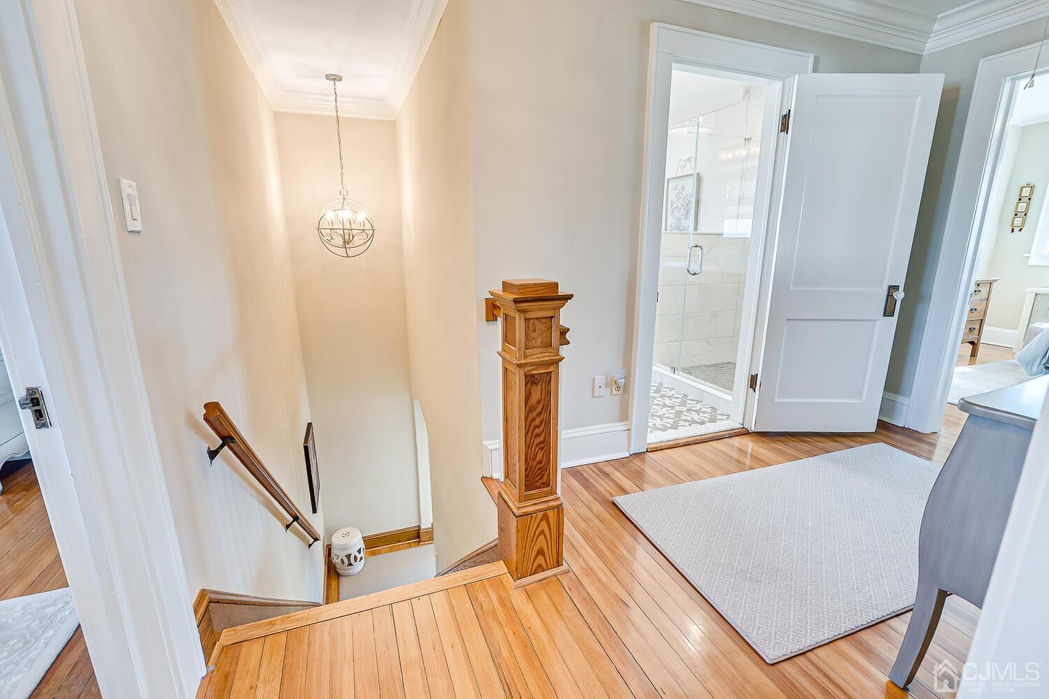 29 Jefferson Avenue Edison, NJ 08837 - Photo 21 of 36 a view of a kitchen with furniture and wooden floor