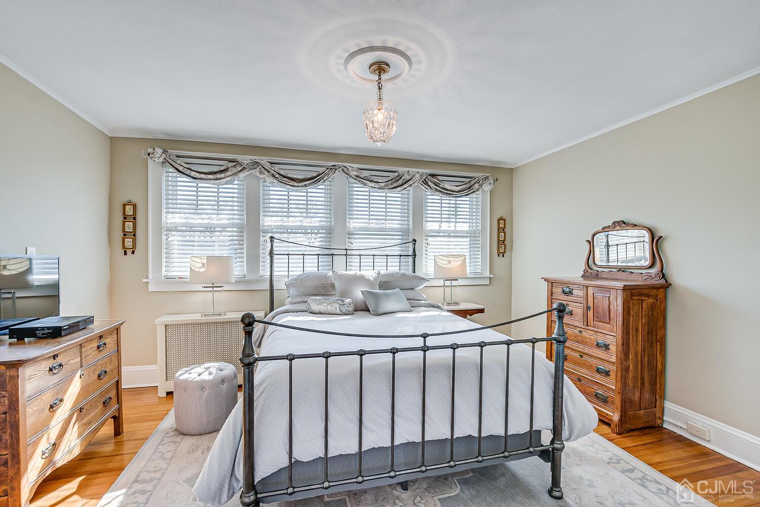 29 Jefferson Avenue Edison, NJ 08837 - Photo 24 of 36 a bedroom with furniture and a window