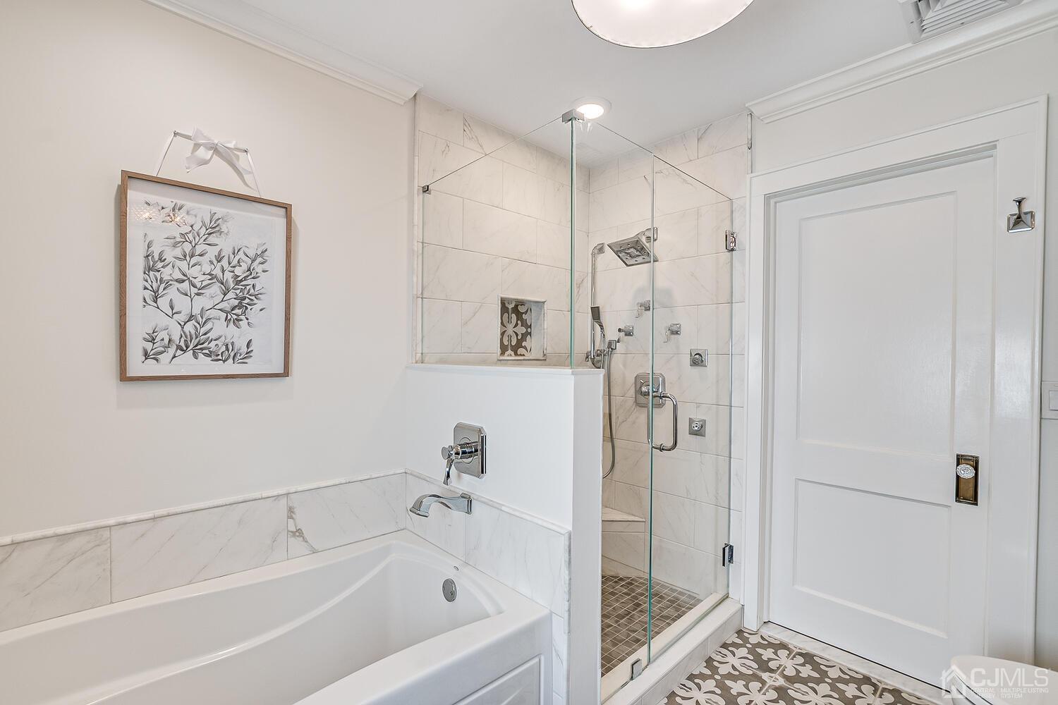 29 Jefferson Avenue Edison, NJ 08837 - Photo 27 of 36 a bathroom with a bathtub and a shower