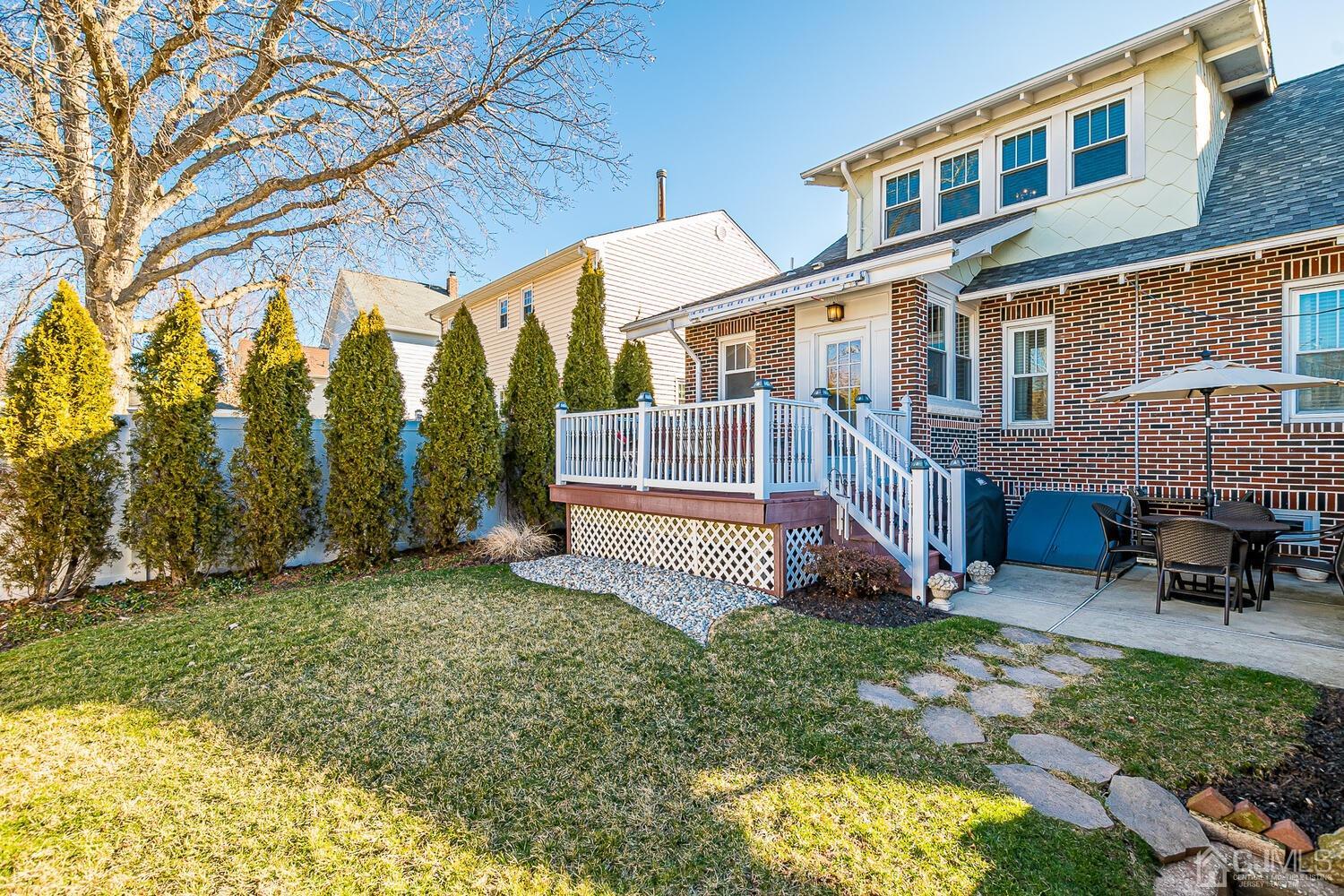 29 Jefferson Avenue Edison, NJ 08837 - Photo 30 of 36 a view of backyard with a garden and deck