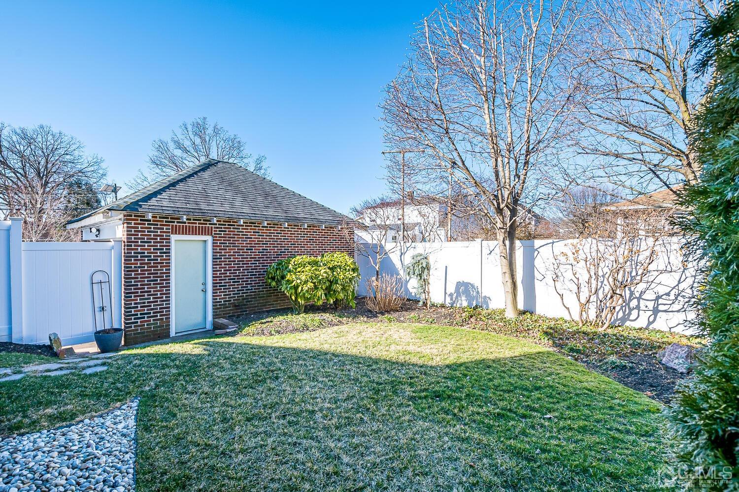 29 Jefferson Avenue Edison, NJ 08837 - Photo 33 of 36 a view of a house with a yard
