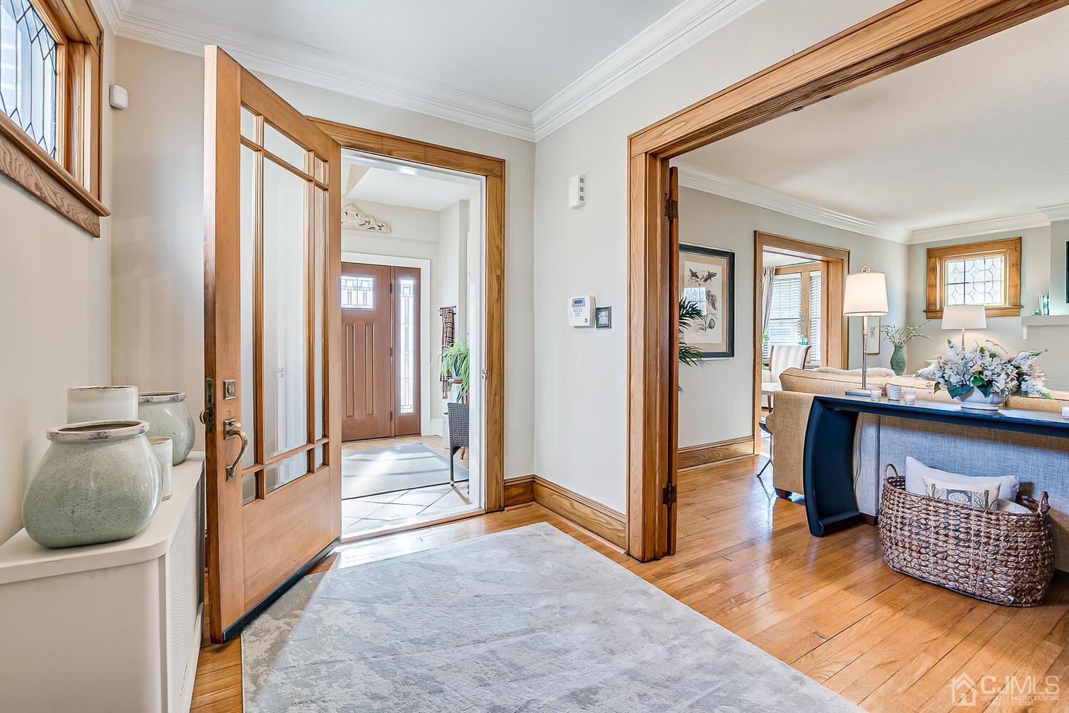29 Jefferson Avenue Edison, NJ 08837 - Photo 5 of 36 a view of an entryway and livingroom with furniture