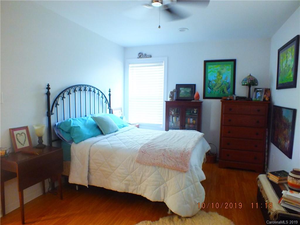 1914 Canal Road Catawba, SC 29704 - Photo 11 of 23 a bedroom with a bed and wooden floor