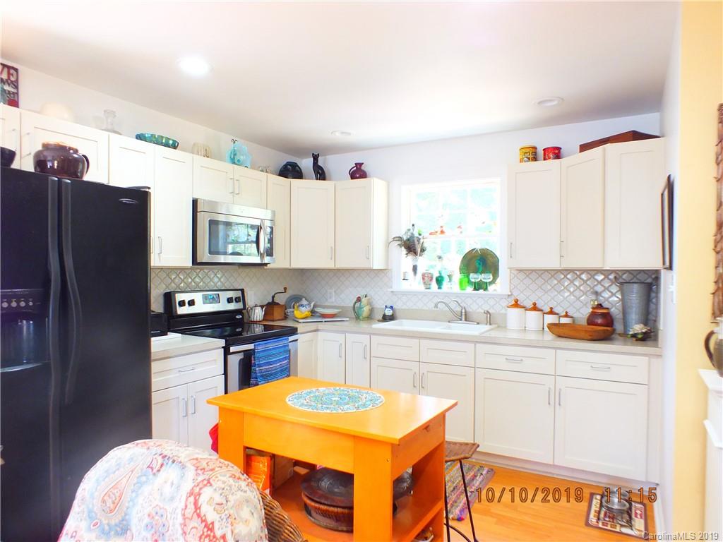 1914 Canal Road Catawba, SC 29704 - Photo 3 of 23 a kitchen with stainless steel appliances granite countertop a sink stove and refrigerator