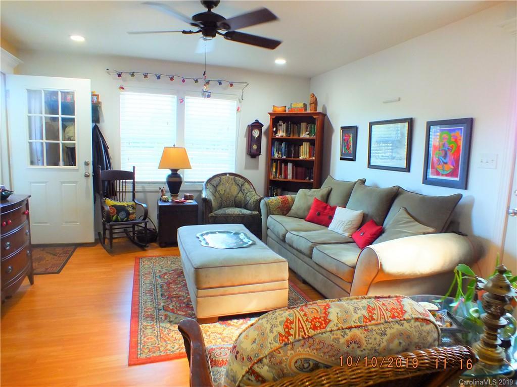 1914 Canal Road Catawba, SC 29704 - Photo 6 of 23 a living room with furniture and a book shelf