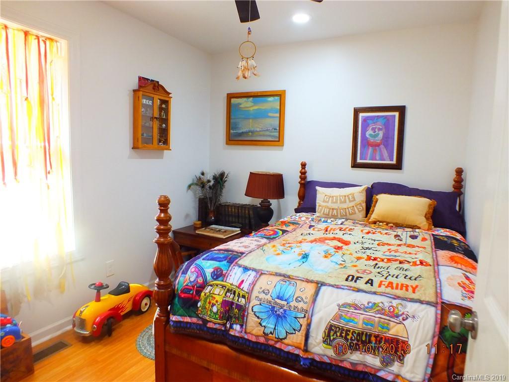 1914 Canal Road Catawba, SC 29704 - Photo 8 of 23 a bedroom with bed and paintings on the wall