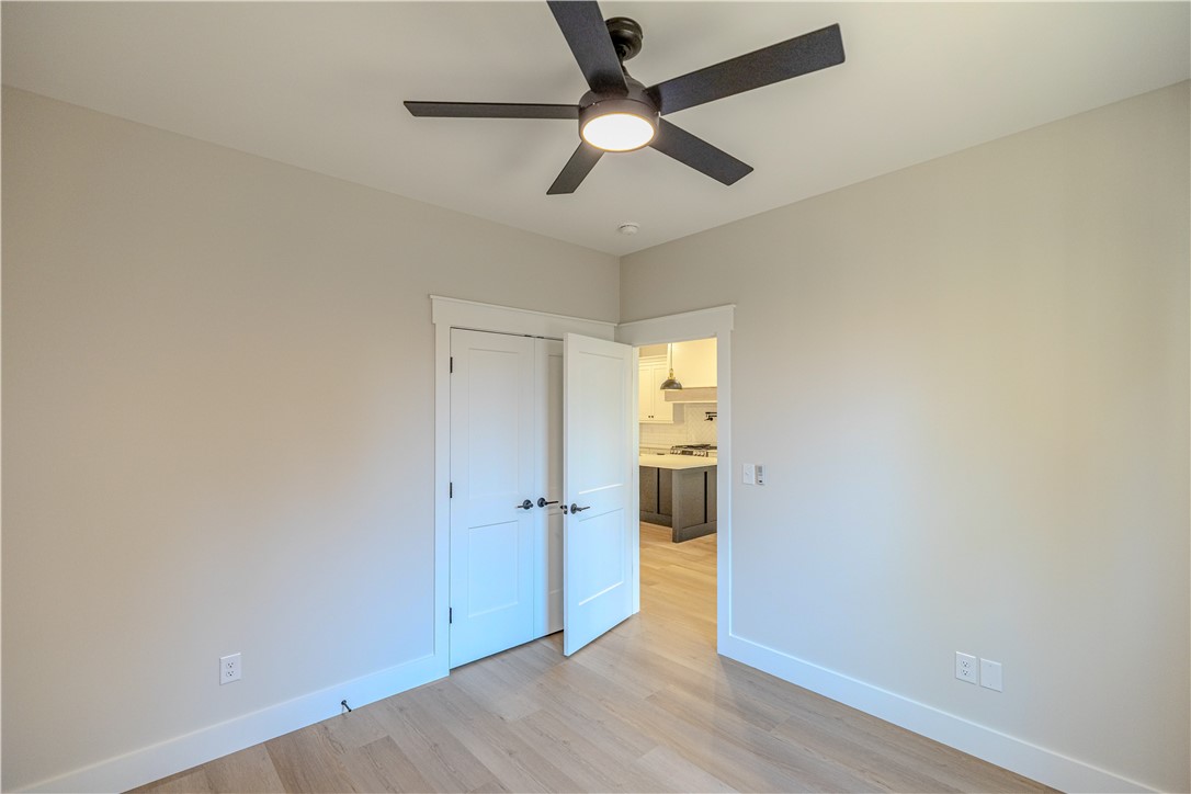1409 Stonehurst Road Anderson, SC 29621 - Photo 27 of 37 This versatile room features light wood flooring and a modern ceiling fan, offering adaptable living.