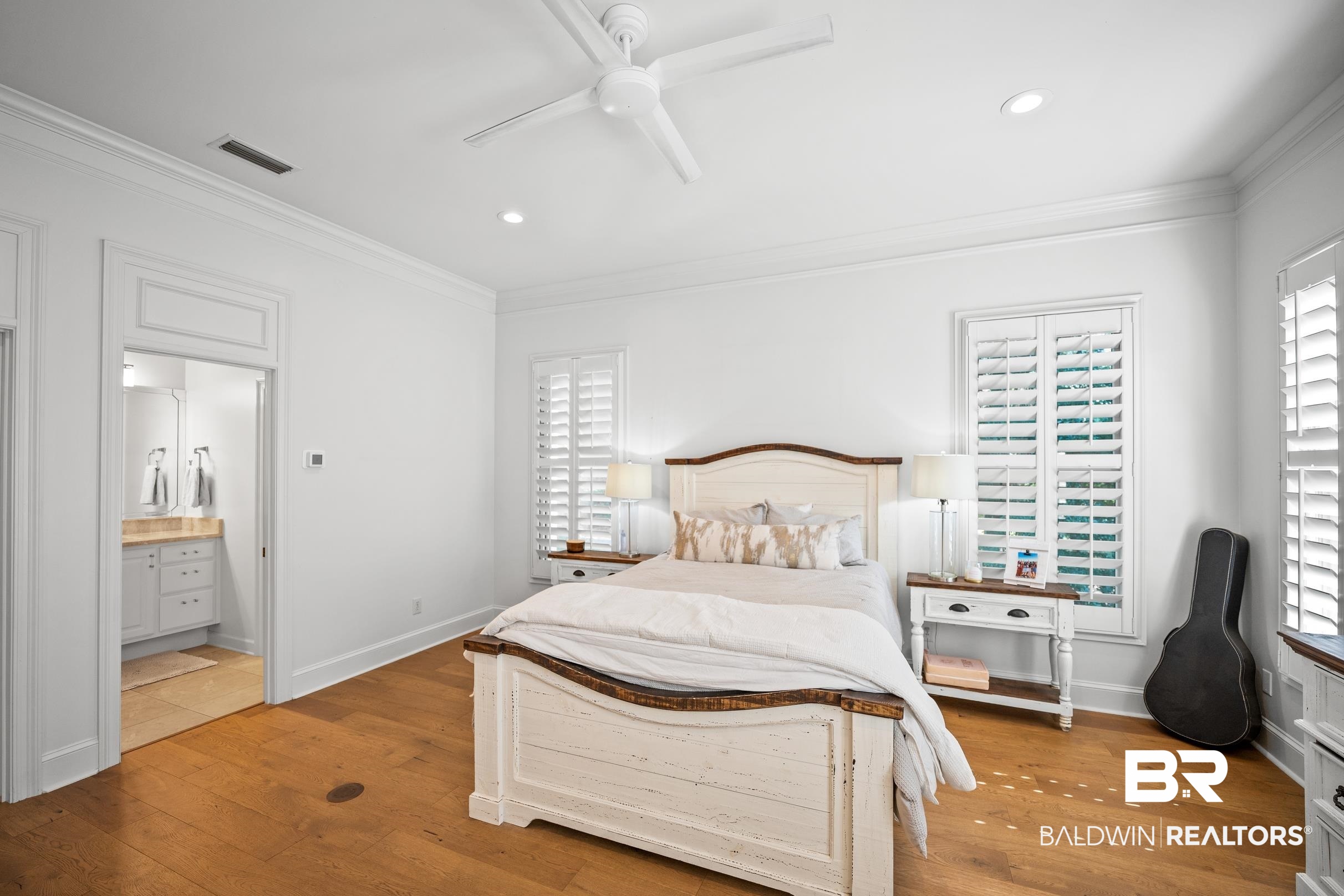 115 Sandy Ford Road Fairhope, AL 36532 - Photo 34 of 47 Bedroom featuring ornamental molding, wood finished floors, recessed lighting, ensuite bath, and a ceiling fan