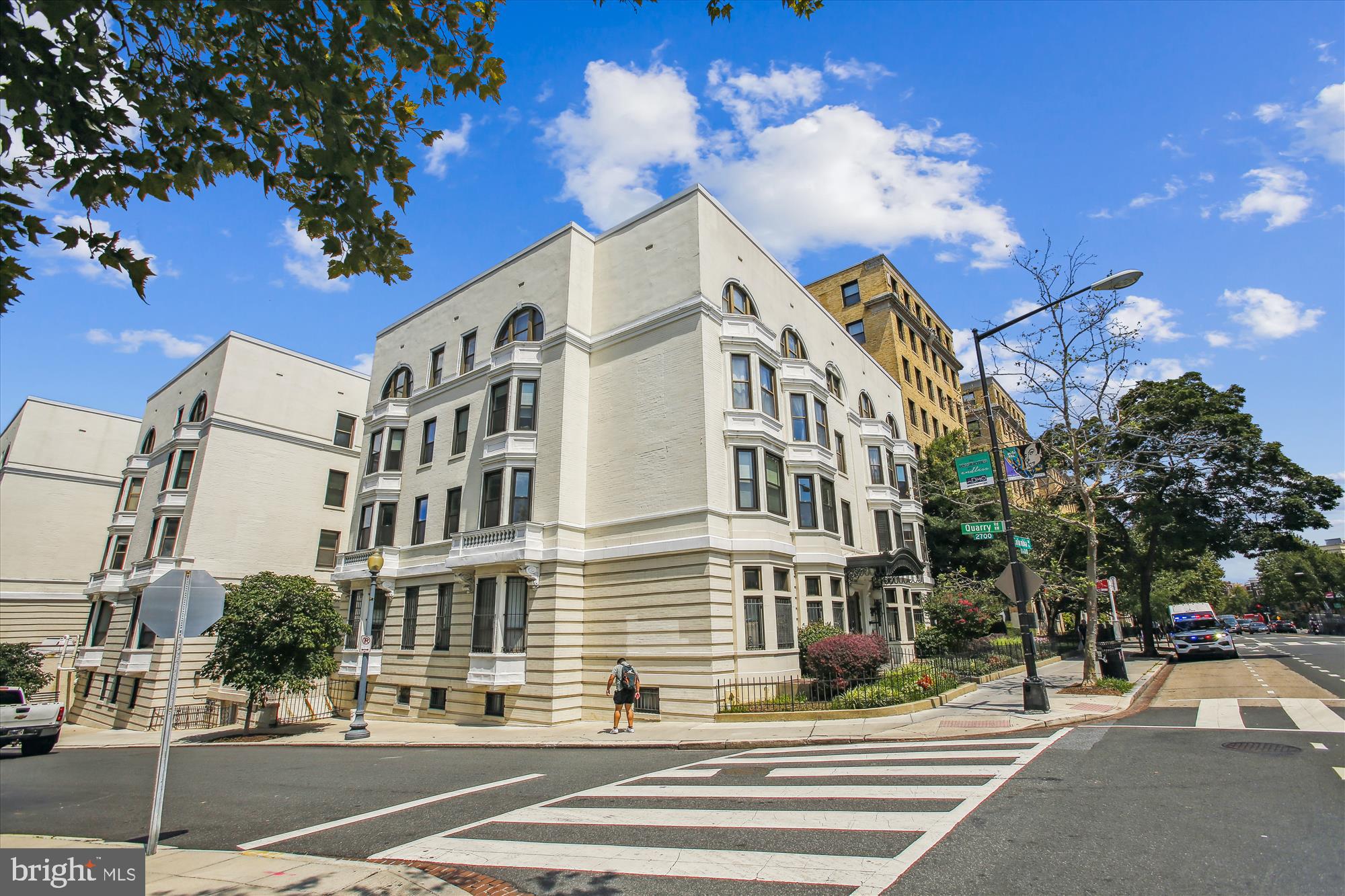 1669 Columbia Road Northwest, Unit 204 Washington, DC 20009 - Photo 4 of 42 a view of a building with a street