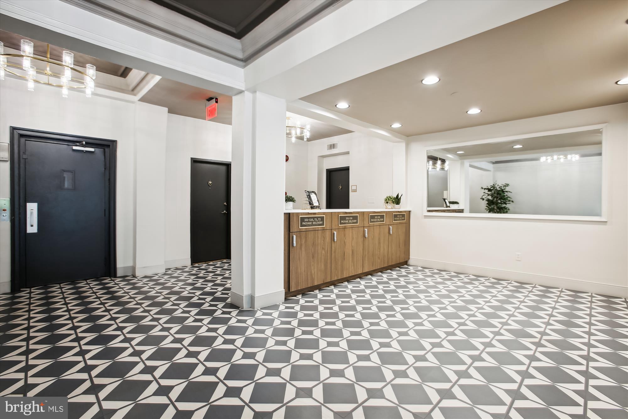 1669 Columbia Road Northwest, Unit 204 Washington, DC 20009 - Photo 7 of 42 a view of a kitchen with a sink and cabinets
