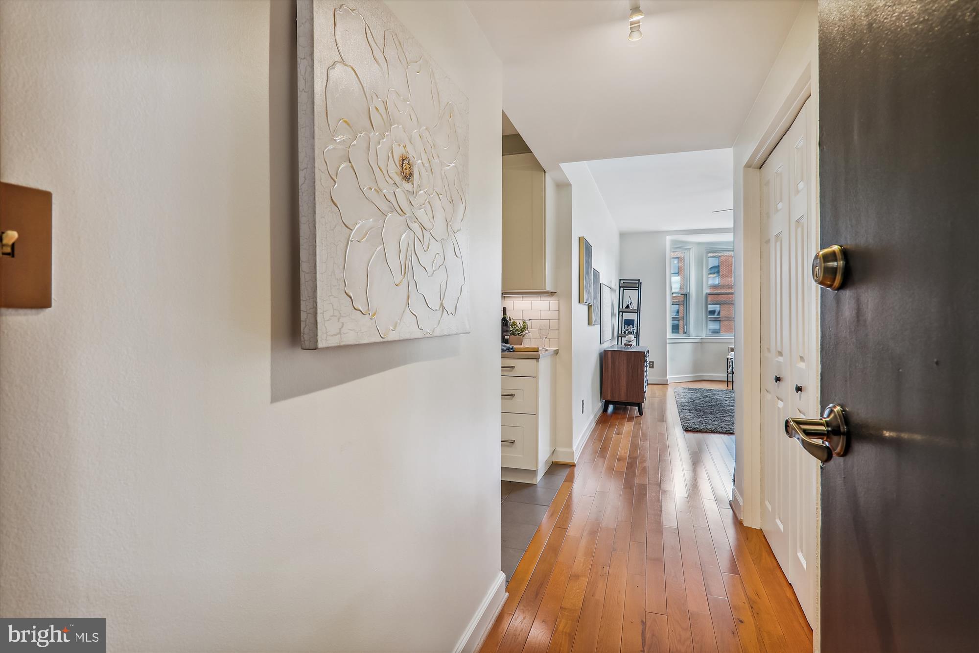 1669 Columbia Road Northwest, Unit 204 Washington, DC 20009 - Photo 10 of 42 a view of a room with wooden floor