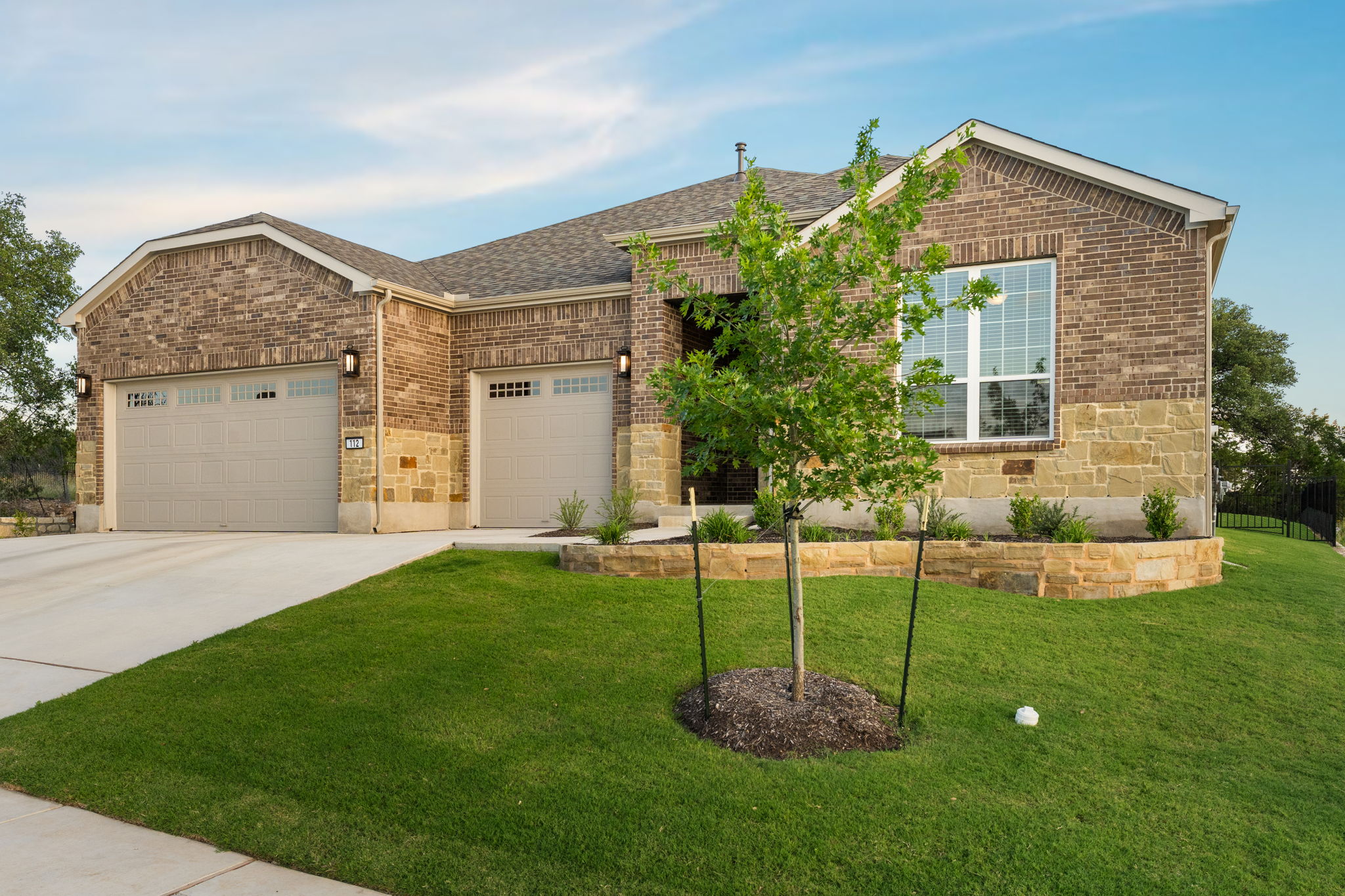 112 Telegraph Lane Georgetown, TX 78633 - Photo 32 of 35 The home features an oversized 3-car garage, a ring doorbell, and Honeywell thermostat.