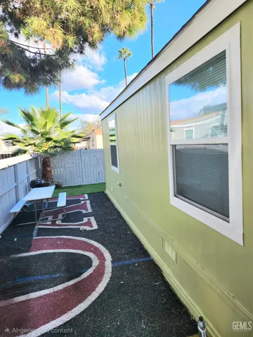 a view of a backyard of the house
