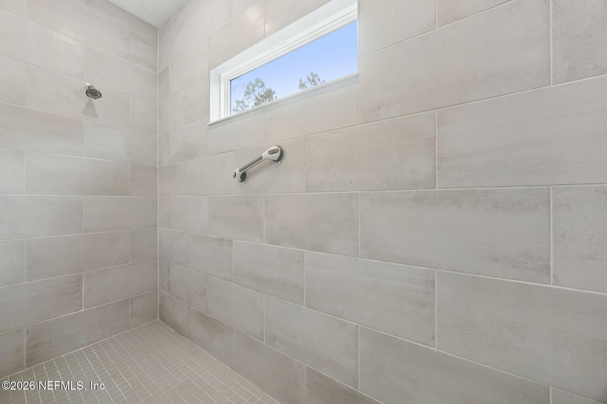 75626 Pondside Lane Yulee, FL 32097 - Photo 34 of 95 a bathroom with a shower