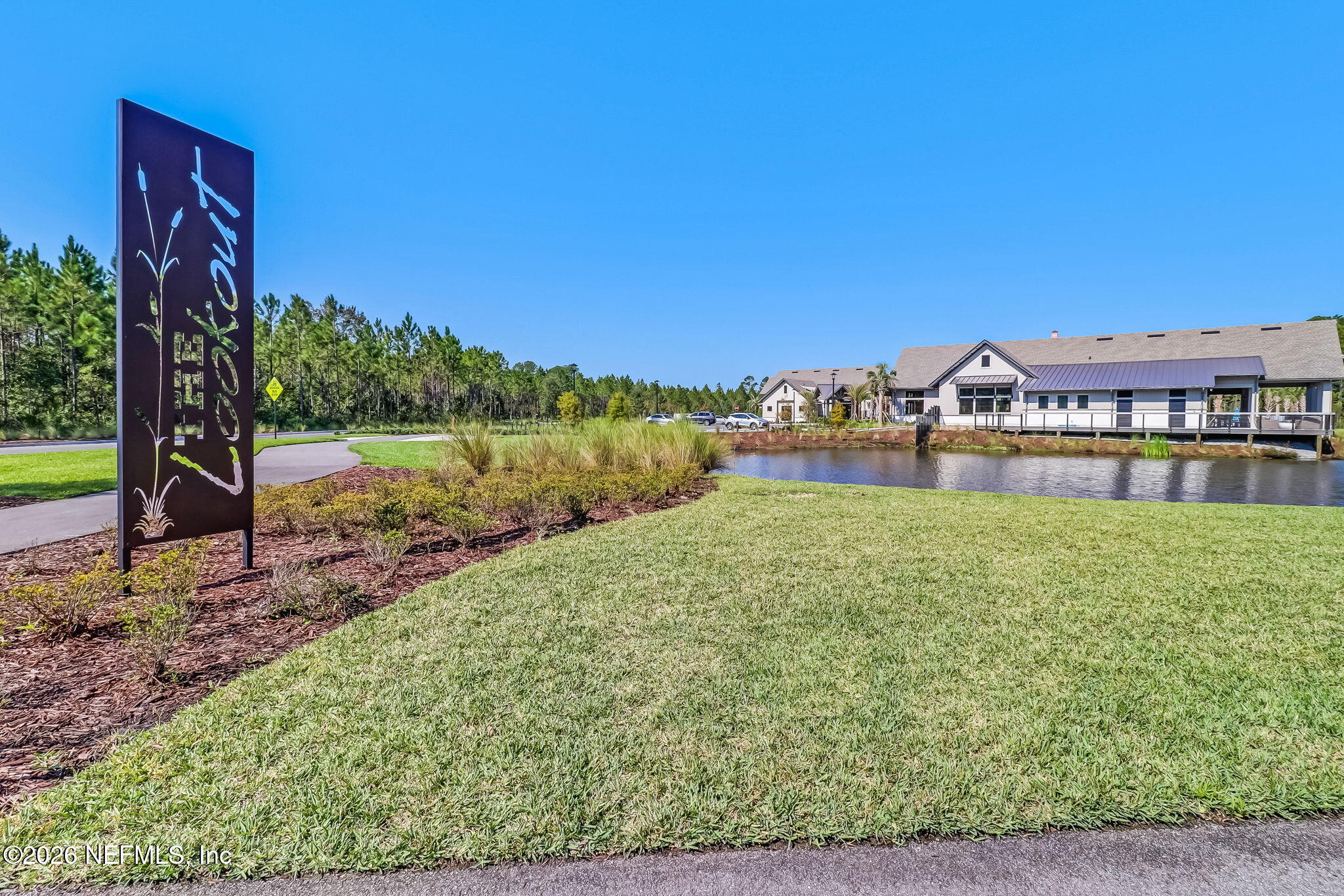 75626 Pondside Lane Yulee, FL 32097 - Photo 62 of 95 a view of a yard with plants