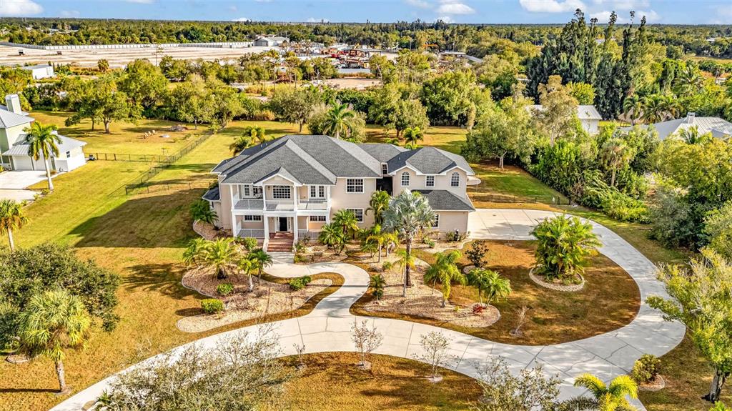 a view of a swimming pool with an outdoor seating