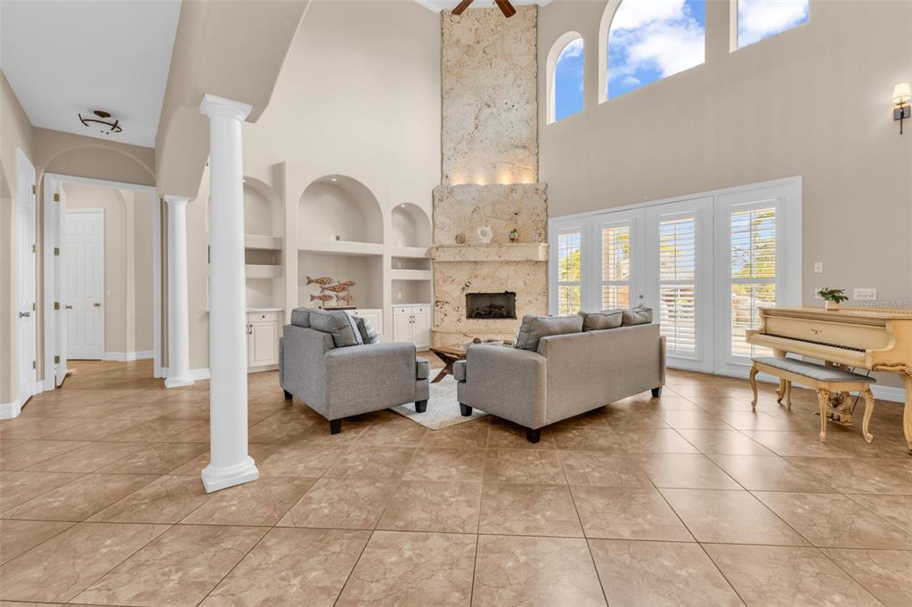 5595 Riverside Drive Punta Gorda, FL 33982 - Photo 14 of 78 a living room with furniture and a large window