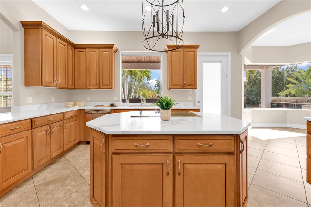 5595 Riverside Drive Punta Gorda, FL 33982 - Photo 20 of 78 a kitchen with a sink cabinets and window