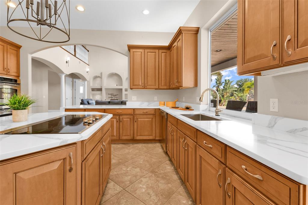5595 Riverside Drive Punta Gorda, FL 33982 - Photo 22 of 78 a kitchen with cabinets a sink and appliances