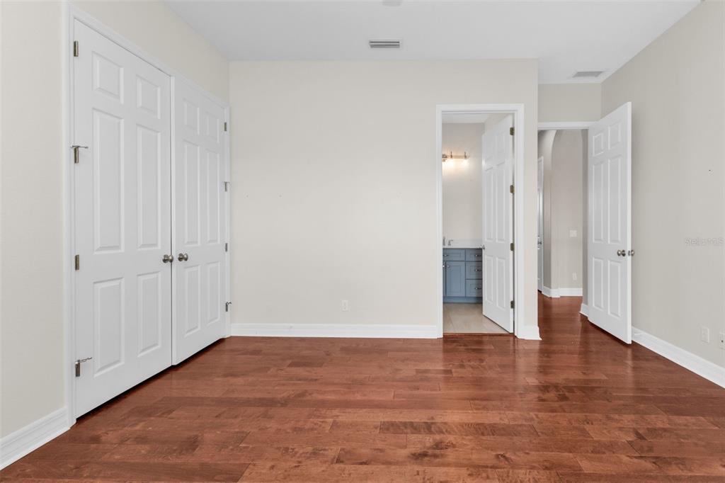5595 Riverside Drive Punta Gorda, FL 33982 - Photo 44 of 78 a view of an empty room and wooden floor