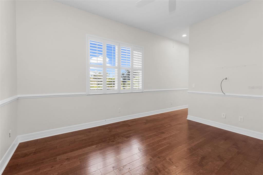 5595 Riverside Drive Punta Gorda, FL 33982 - Photo 47 of 78 a view of a room with wooden floor and window