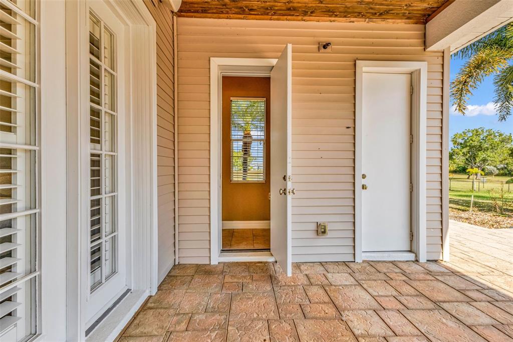 5595 Riverside Drive Punta Gorda, FL 33982 - Photo 60 of 78 a view of a entryway door of the house