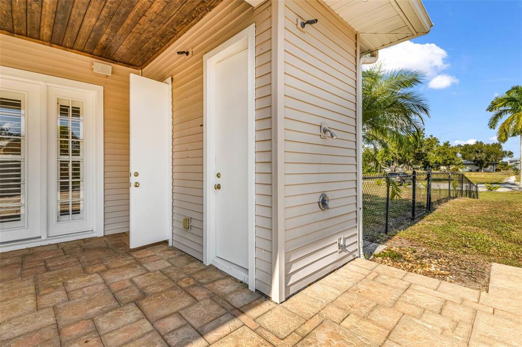5595 Riverside Drive Punta Gorda, FL 33982 - Photo 61 of 78 a view of a house with backyard and wooden fence