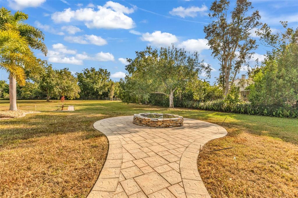 5595 Riverside Drive Punta Gorda, FL 33982 - Photo 74 of 78 a view of a yard with basketball court