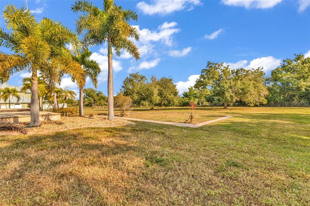 5595 Riverside Drive Punta Gorda, FL 33982 - Photo 75 of 78 a view of swimming pool with an outdoor space and seating area