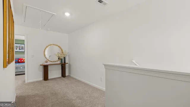 a view of a livingroom with furniture