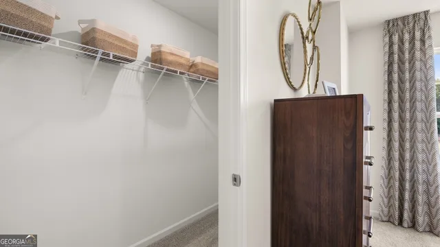 a bathroom with a sink mirror vanity and toilet
