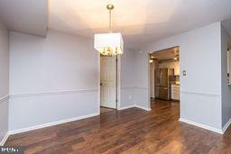 1204 Mountainview Drive Chesterbrook, PA 19087 - Photo 11 of 25 wooden floor in an empty room with a window