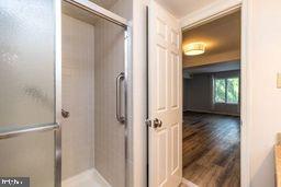 1204 Mountainview Drive Chesterbrook, PA 19087 - Photo 22 of 25 a view of a bathroom from a hallway