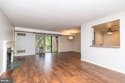 1204 Mountainview Drive Chesterbrook, PA 19087 - Photo 8 of 25 a view of empty room with wooden floor and fan