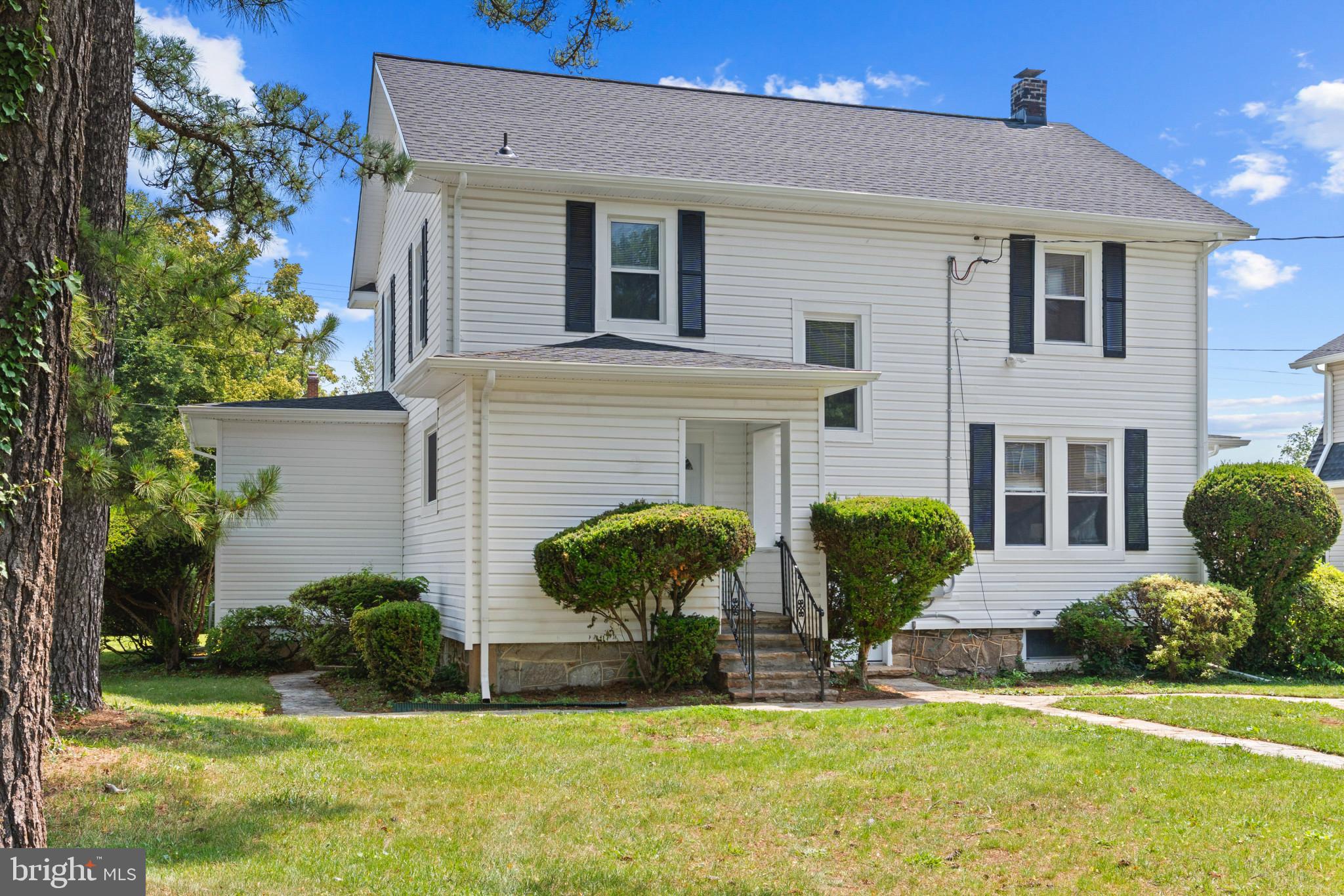 5728 Clover Road Baltimore, MD 21215 - Photo 34 of 40 a view of a house with a yard and plants