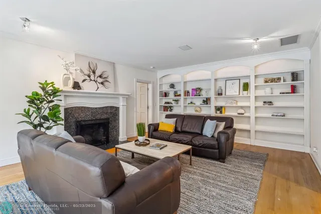 a bathroom with a shower and a sink