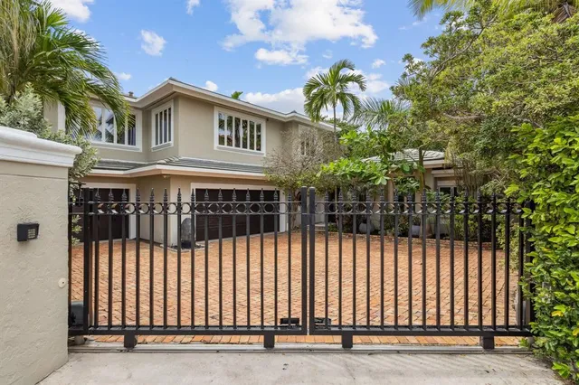 a living room with stainless steel appliances kitchen island granite countertop a large kitchen counter top and stainless steel appliances