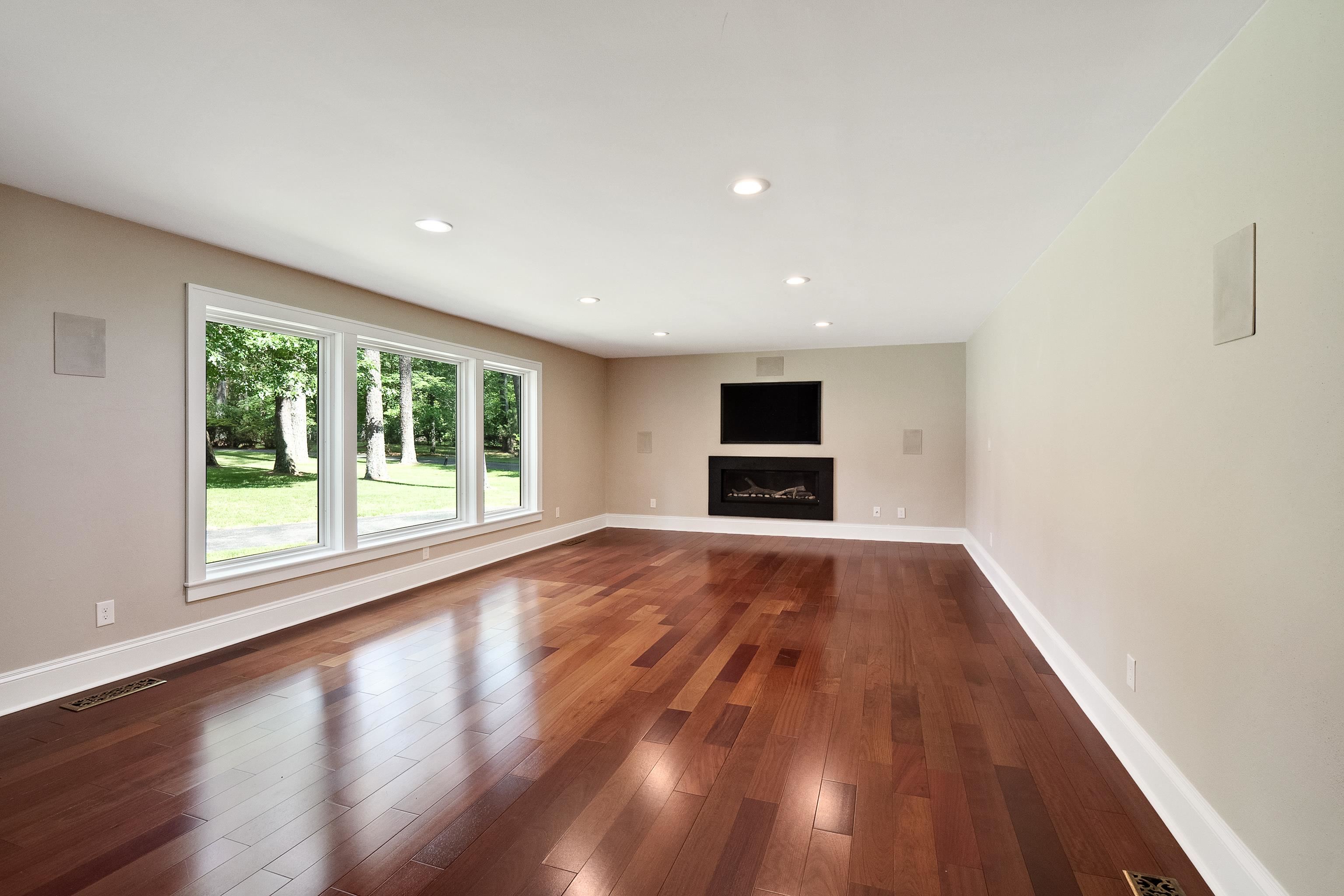 11046 Raleigh Lagrange Road East Eads, TN 38028 - Photo 8 of 40 Unfurnished living room featuring dark wood-type flooring