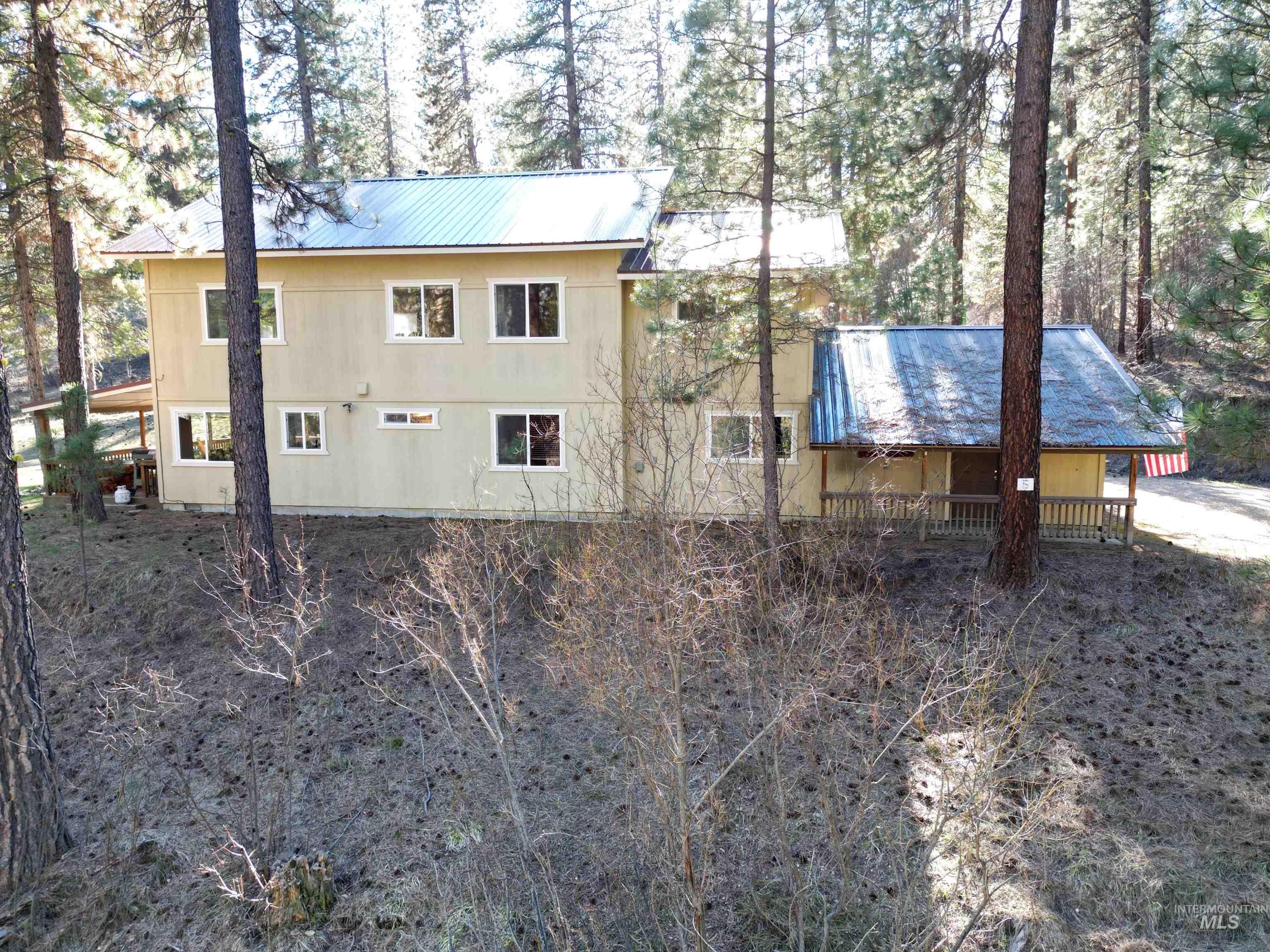 14 Forest Trail Road Garden Valley, ID 83622 - Photo 3 of 45 View of side of property with a metal roof