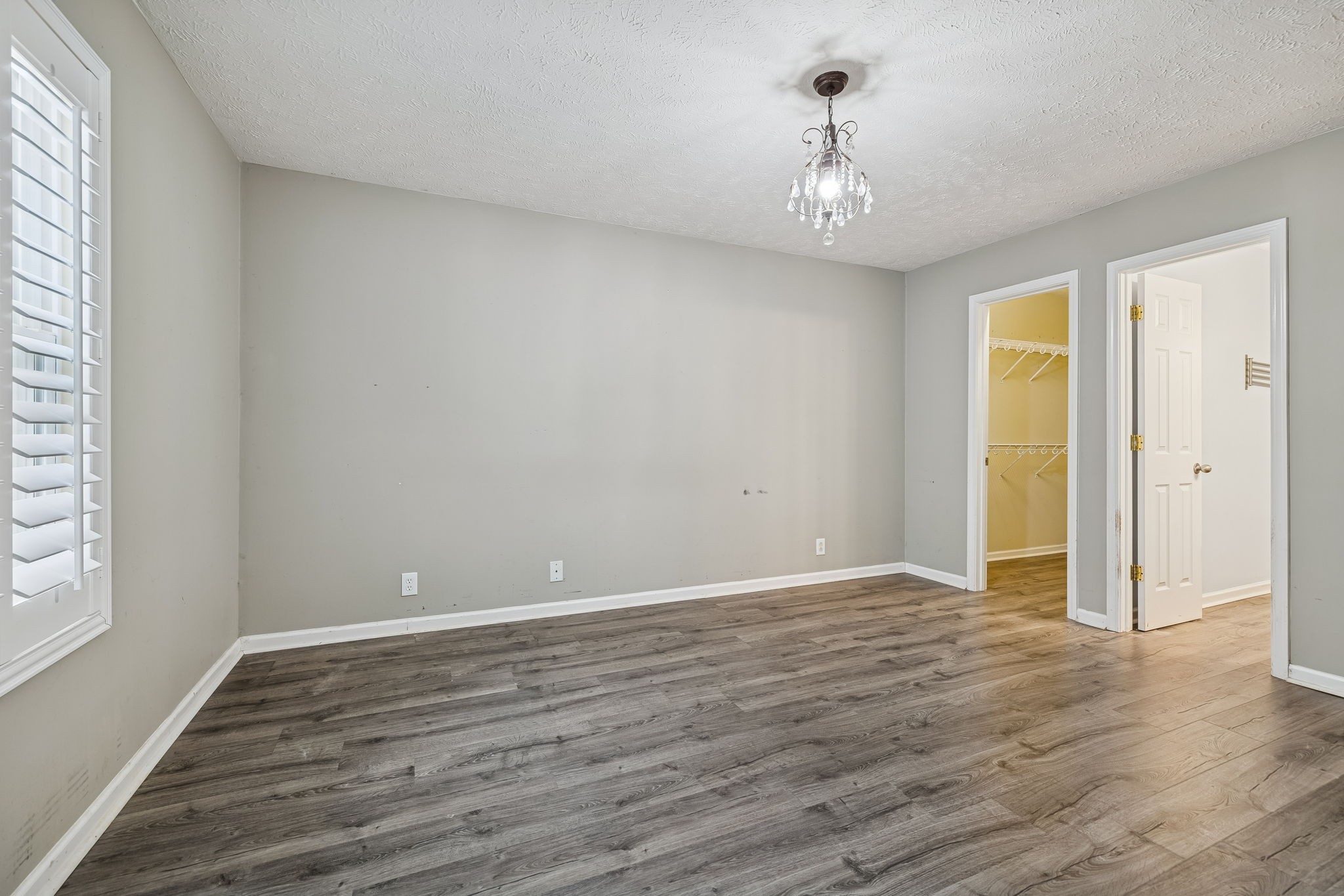 4869 Chelanie Circle Murfreesboro, TN 37129 - Photo 18 of 35 a view of an empty room with wooden floor and a window