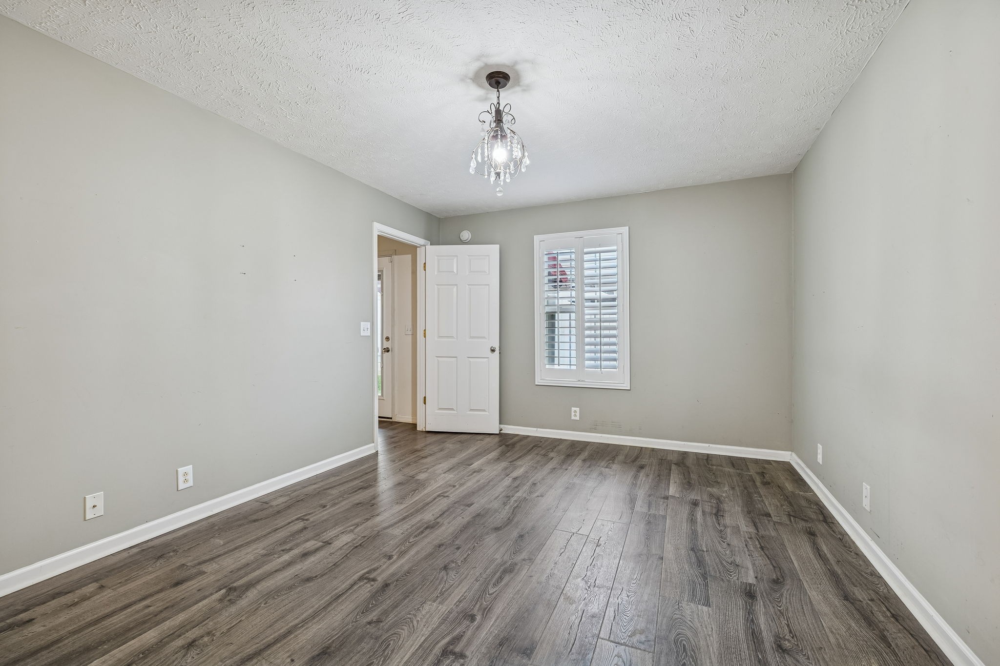4869 Chelanie Circle Murfreesboro, TN 37129 - Photo 19 of 35 wooden floor in an empty room with a window